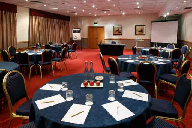 Cabaret-style conference suite at Mercure Maidstone for corporate meetings and event hire.