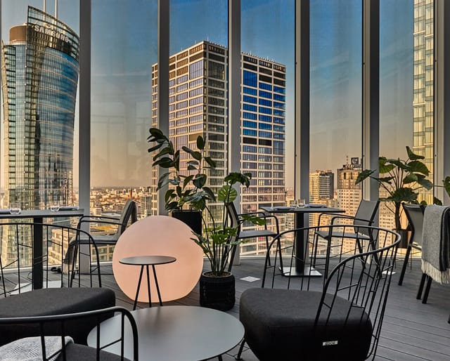 Roof Skybar restaurant with panoramic city skyline views, perfect for luxury events and gala dinners.