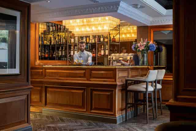 Elegant hotel bar in Ellen Kensington for networking receptions and cocktail events.