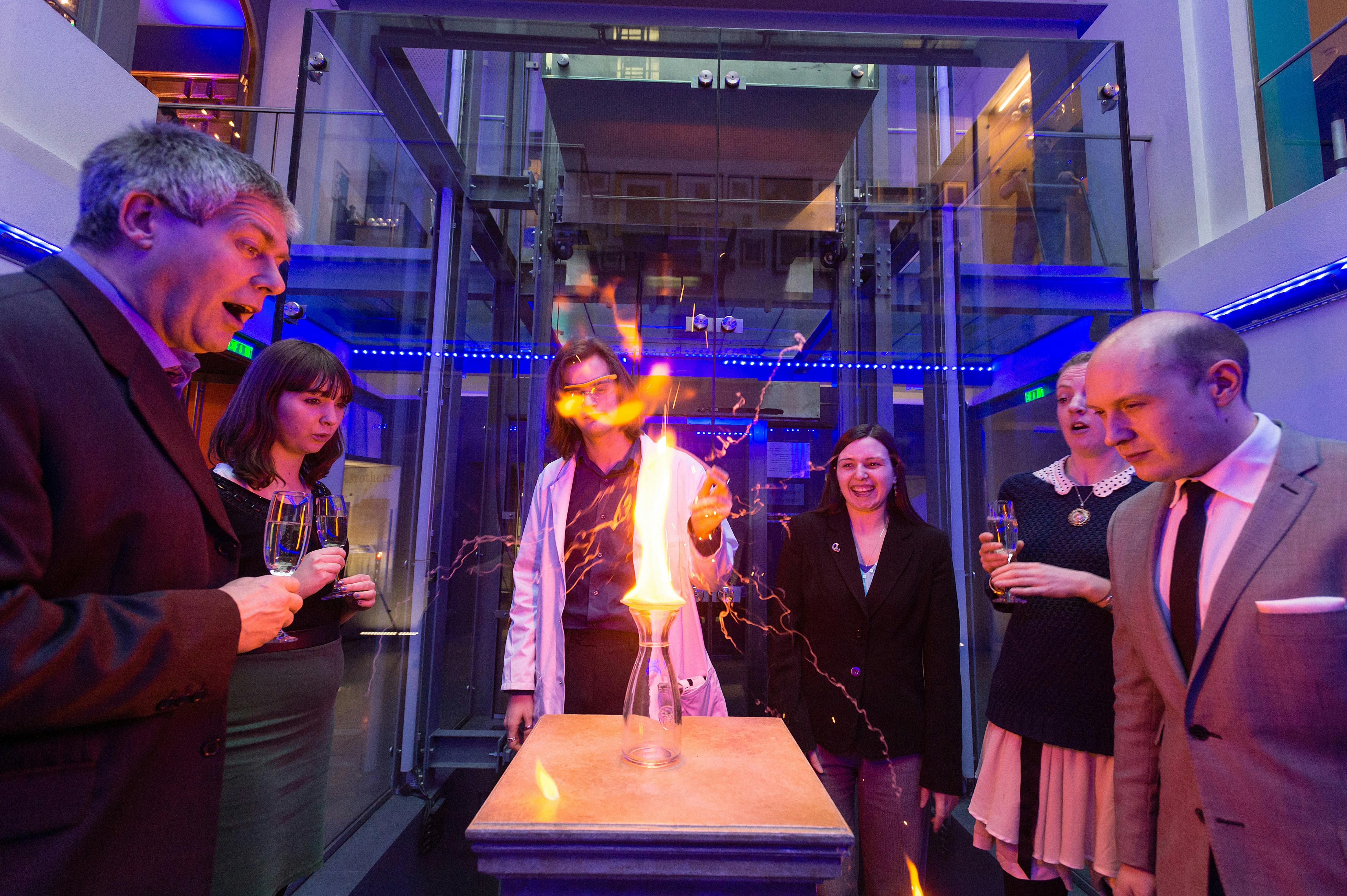 Dynamic event in The Atrium, Royal Institution, showcasing science and technology demonstrations.