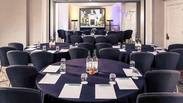 Boardroom setup in Mercure Gloucester Congress Room for corporate presentation and workshop.