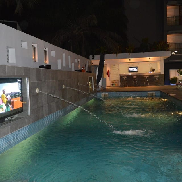 Poolside venue at Maison Fahrenheit with lounge seating for networking and VIP events.