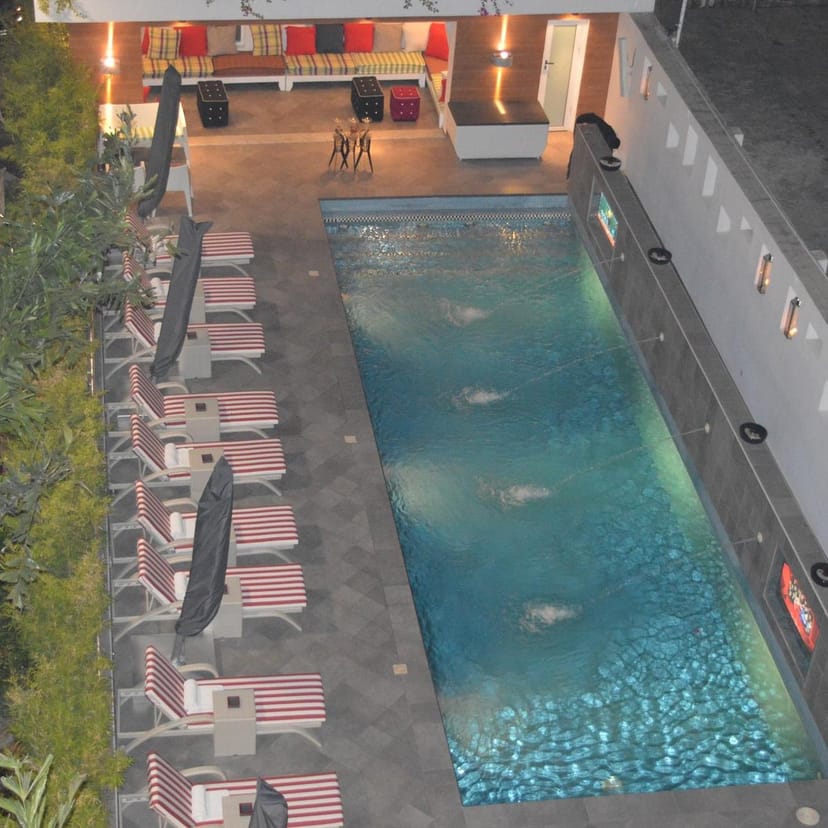 Poolside at Maison Fahrenheit, perfect for executive retreats and networking events.