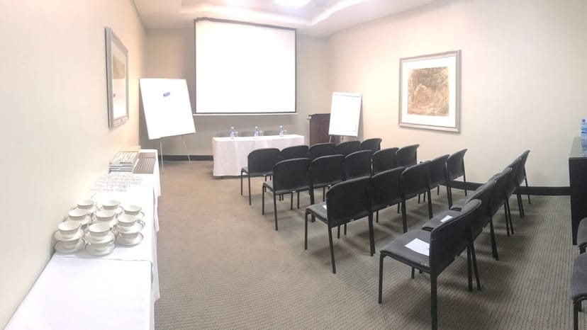 Theater-style Antonello Meeting Room with A/V setup for training and corporate events.