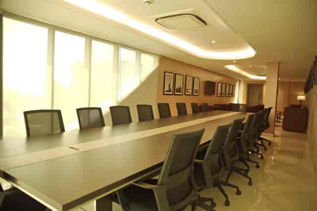 Boardroom setup at EbonyLife Place: executive meeting space with natural light for conferences.