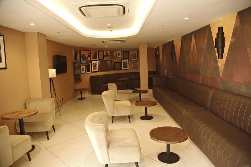 EbonyLife Place lounge with modern seating, ideal for corporate networking and VIP events.