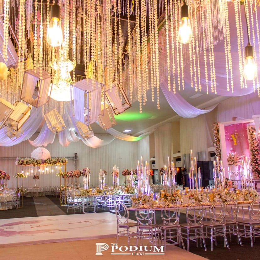 Luxury event hall in The Podium Lekki with crystal chandeliers and elegant wedding decor.