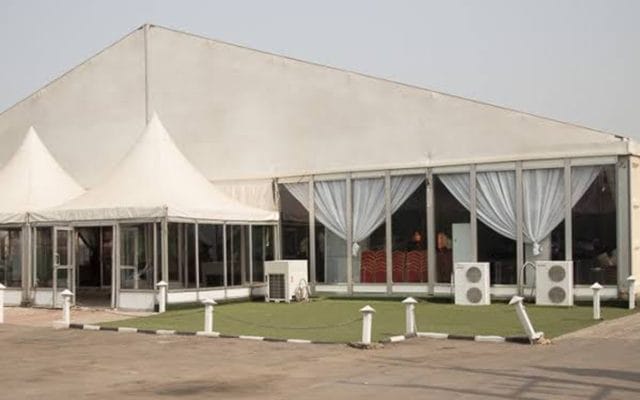 Clear-span event tent at Iconic Castle, premium venue for corporate and wedding event rentals.