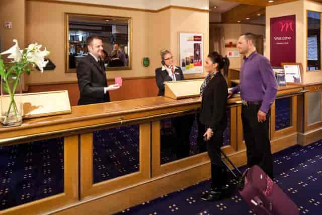 Professional event check-in at Mercure Ayr Hotel meeting rooms for business conferences.