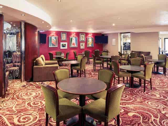 Mercure Livingston hotel breakout room with modular seating for corporate events and networking.