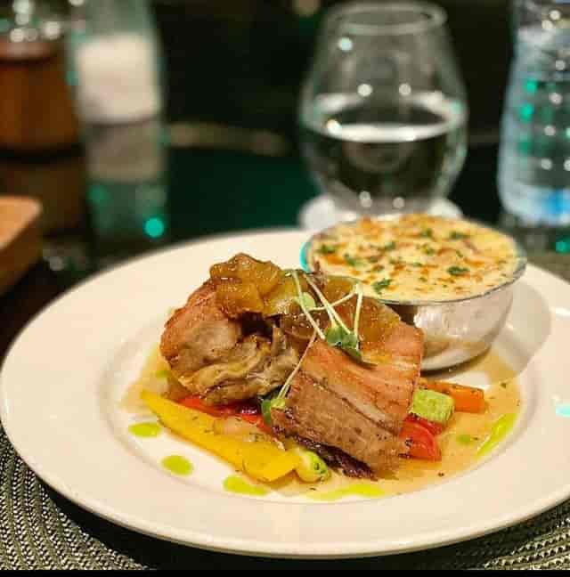 Gourmet entree with au gratin at Noir Lagos, perfect for upscale corporate dinners and galas.