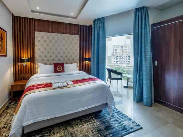 Classic Room at The Lilygate Lagos with workspace balcony for corporate business travel booking.