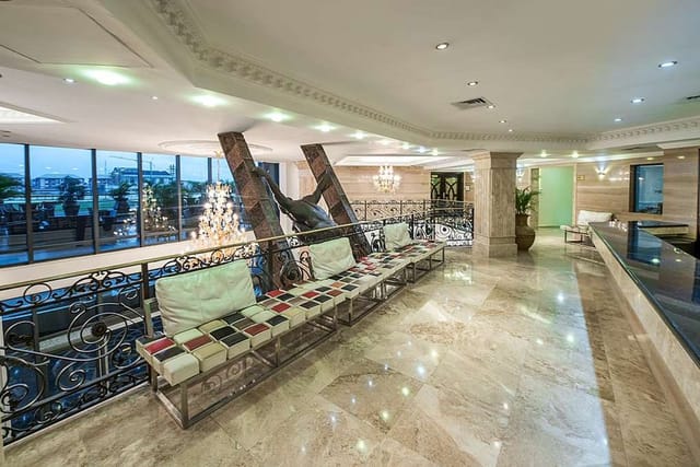 Strategic arena pre-function area with marble floors for Lagos corporate events and conferences.