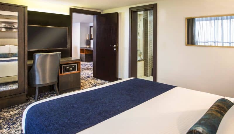 Oduduwa Hall guest room, Mövenpick Hotel Ikoyi, with workspace for corporate events and conferences.