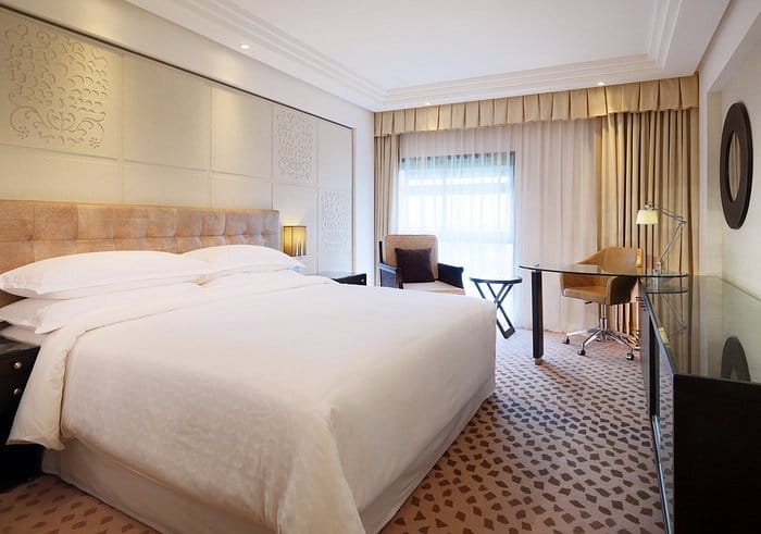 Sheraton Lagos Hotel function suite with sleek desk for corporate events and business conferences.