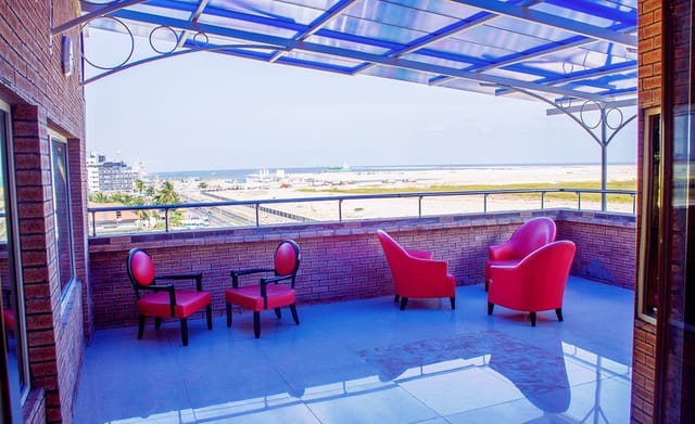 BWC Hotel VIP lounge with vibrant accents for small group networking and corporate events.