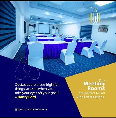 Classroom-style conference room at BWC Hotel with purple skirting for corporate training seminars.