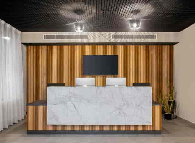 Modern marble registration desk at Nordic Hotel Lagos, ideal for corporate events and conferences.