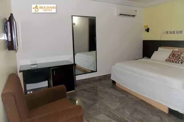 Budget-friendly Vatican room at Brighams Suites for business travel and corporate lodging.