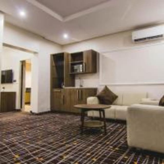 Lobby at BON Hotel Lekki Residence featuring a kitchenette for VIP meetings and event planning.