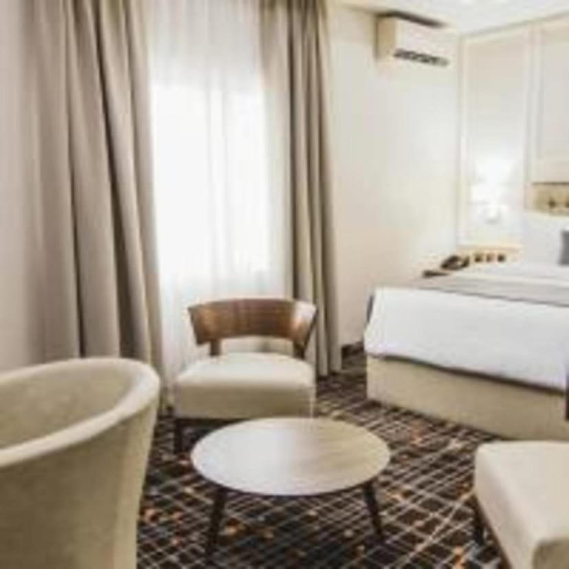 Upscale BON Hotel Lekki Residence room with workspace for corporate events and business meetings.