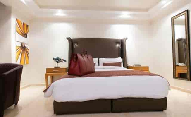 Victoria Crown Plaza hotel meeting room with neutral decor for corporate event and conference venue.