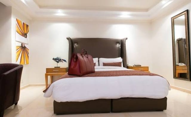 Victoria Crown Plaza hotel meeting room with neutral decor for corporate event and conference venue.