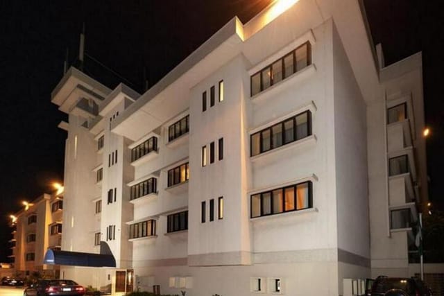 Villa Monument Hotel boardroom at night, intimate space for corporate retreats and board meetings.