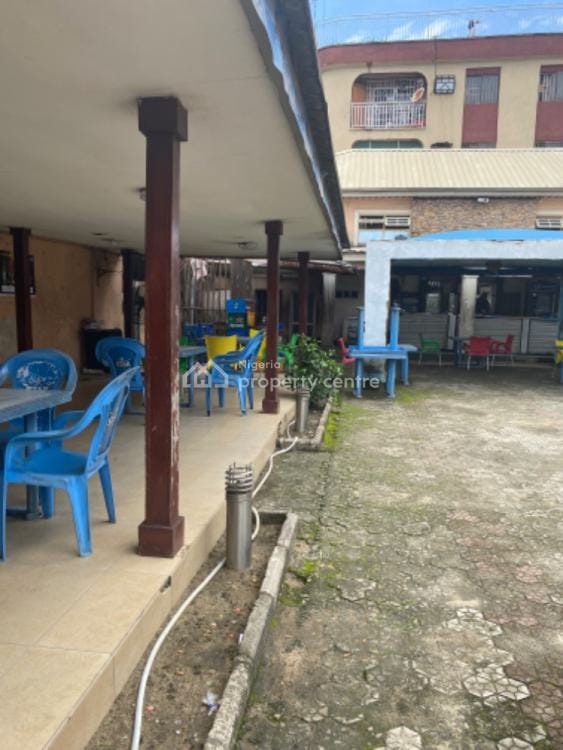 Kilo Royal Hotel outdoor venue: weathered open-air space for casual events and rustic gatherings.