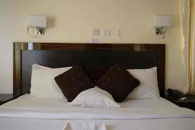 Messy hotel room at Adig Suites Amuwo Odofin: poor housekeeping and unprofessional turndown service.