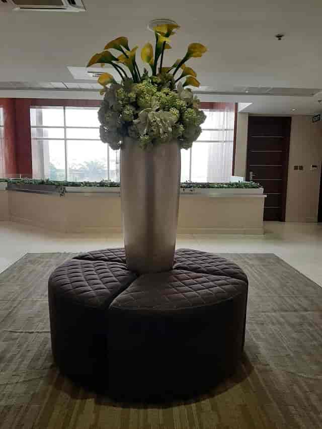 Circular ottoman in Pearlwort Hotel & Suites PW Hall event pre-function space.