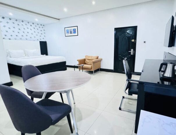 Kaduna Hall at Novotel: Functional bleisure suite for remote work and corporate event planning.
