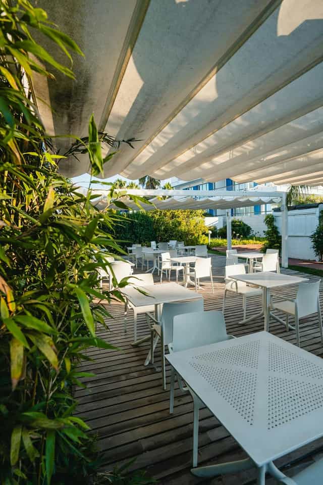 Retractable canopy meeting room at Marina Club Lagos Resort for corporate events and networking.