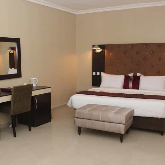 Eastgate Hotel Lekki room with workspace for business conferences and corporate travel.