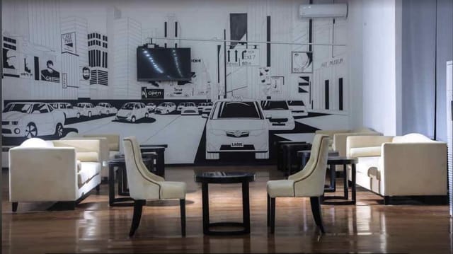 Creative meeting room with urban mural for corporate brainstorming and networking events.