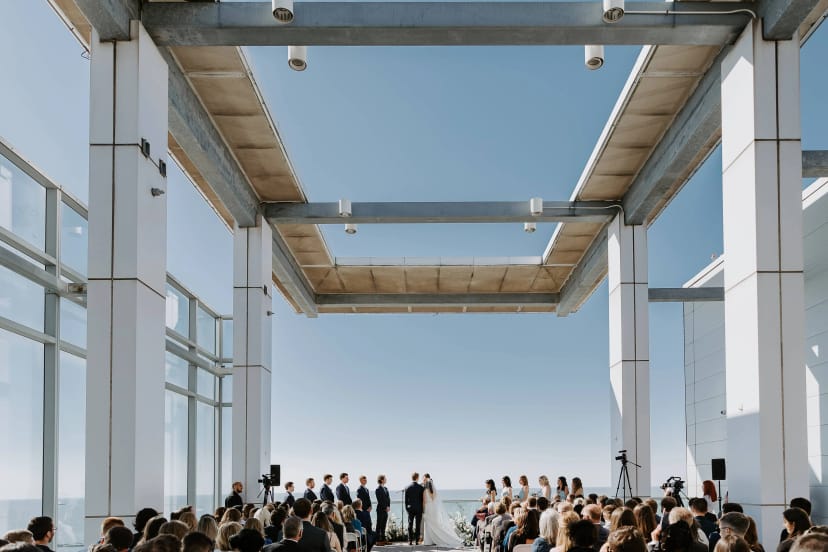 The Penthouse at Lago: Modern open-air wedding venue with dramatic architectural ceremony backdrop.
