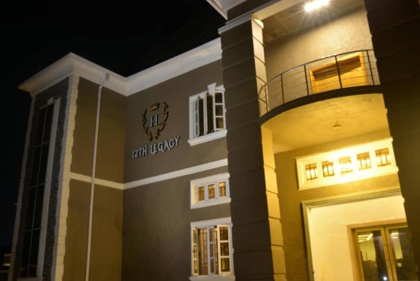 Boutique hotel bar with warm entryway for corporate reception and evening event venue.