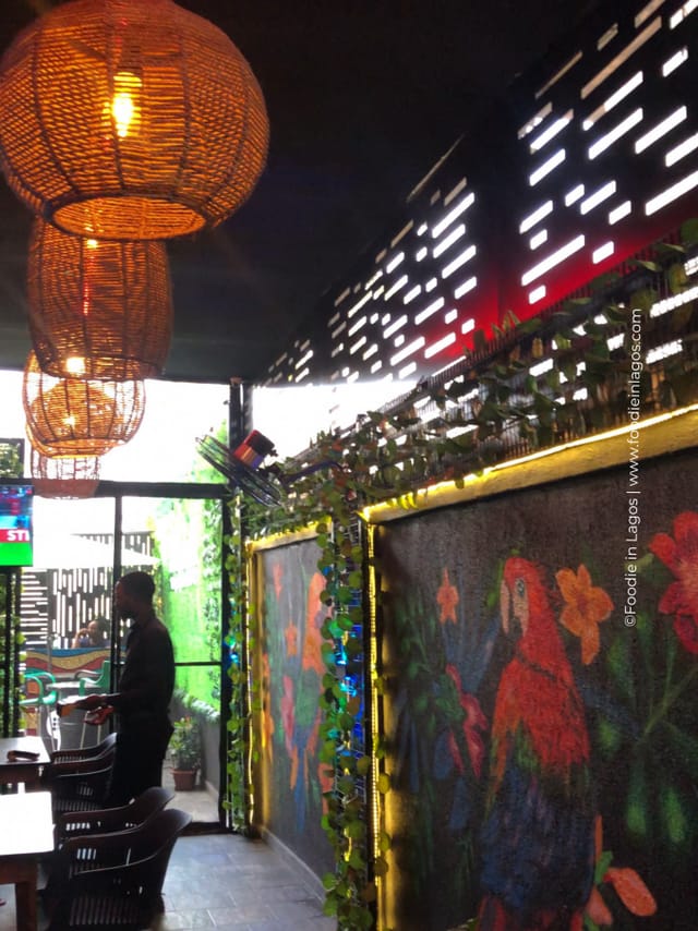 Tropical indoor-outdoor restaurant venue for networking mixer and social reception.