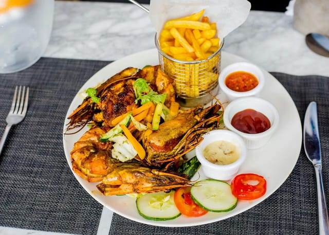 Grilled prawn entree at The Loft Ikoyi, upscale casual banquet dining and event catering.