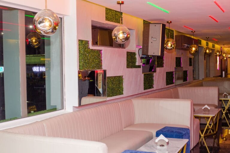 Modern VIP lounge in The Loft Ikoyi with tufted seating, ideal for networking and evening receptions.