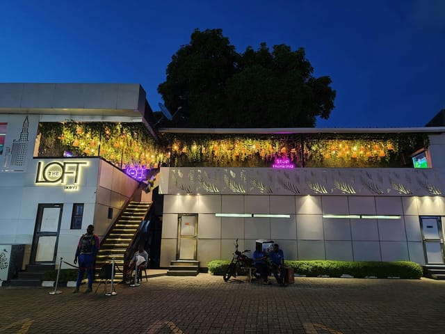 The Loft Ikoyi: Modern multi-level venue with neon lighting for social mixers and VIP after-parties.