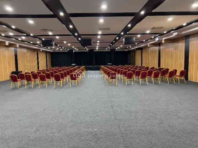 Dinner theater ballroom at The Canyon Lekki event center, featuring a versatile conference setup.