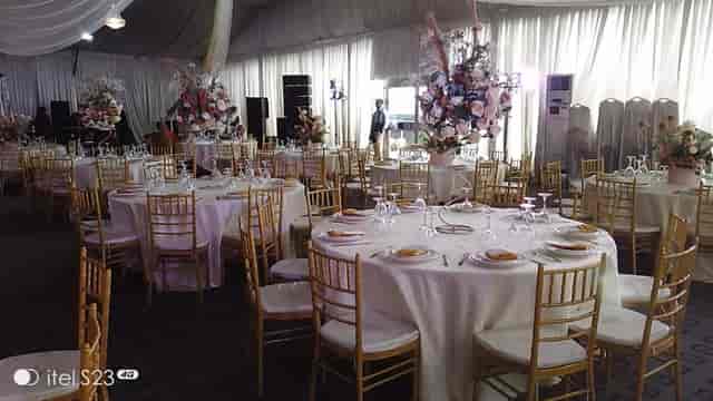 Elegant dinner theater setup at The Canyon Lekki with gold chairs for weddings and formal events.