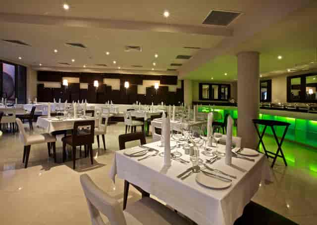 The Grillroom banquet hall with neon buffet, perfect for corporate gala and evening reception.