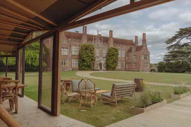 Tipi venue with outdoor deck and lawn for corporate retreats and garden events.