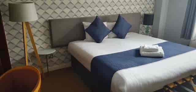 Papaveri at Draycote Hotel: blue-and-grey conference room for business travel and event lodging.