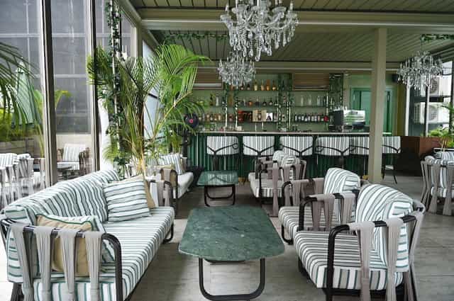 Upscale Delborough lounge with outdoor seating, perfect for networking receptions and VIP events.