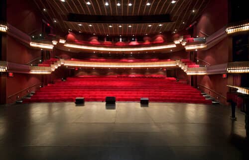 Pam Golding Theatre with tiered red seating, perfect for performances and conferences.