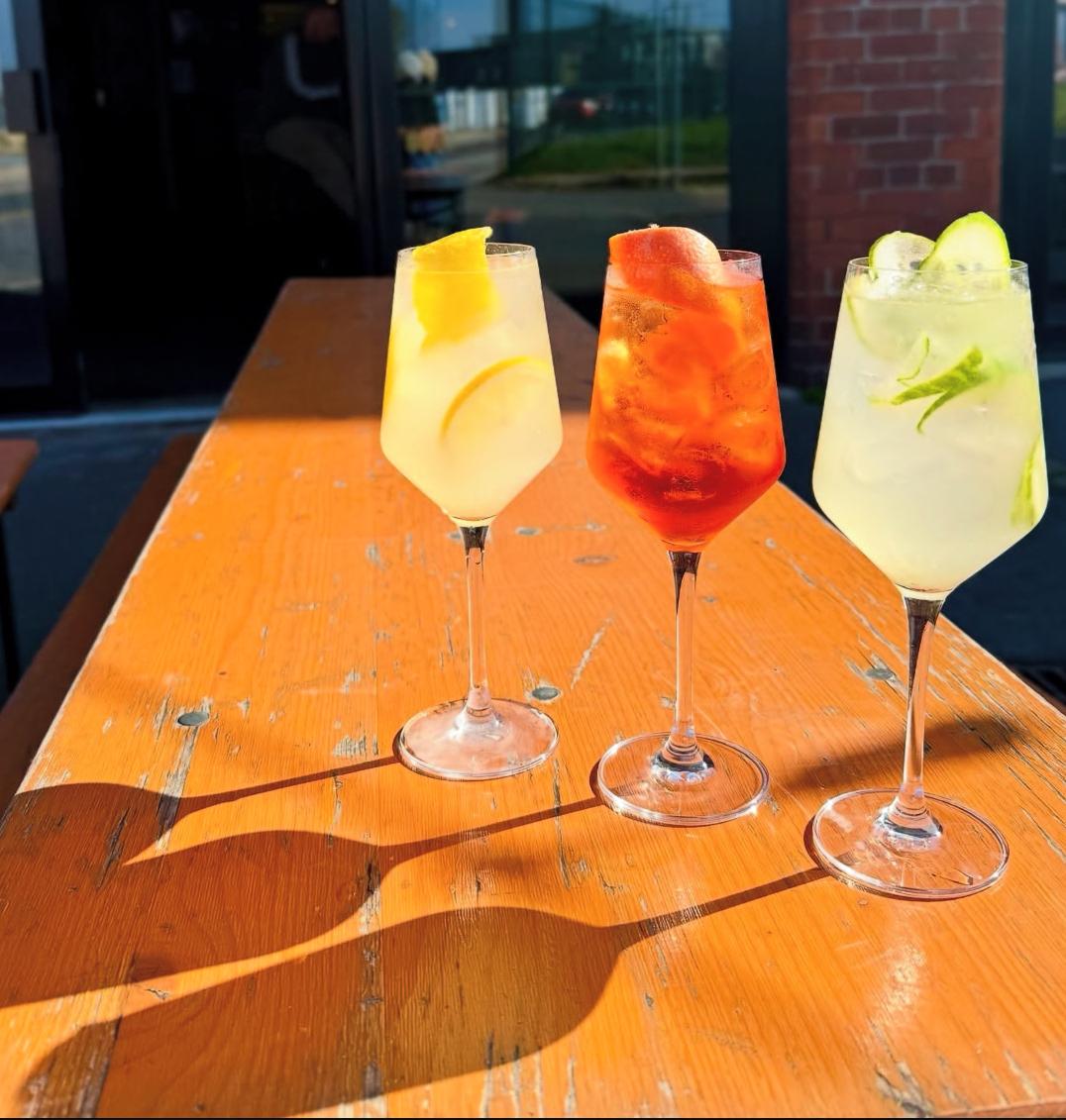 Cocktail flight at North Bar Aire Park, perfect for upscale outdoor networking events.