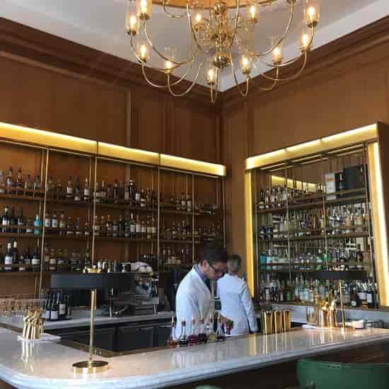 Upscale bar with premium back-bar for VIP welcome receptions and networking happy hour events.